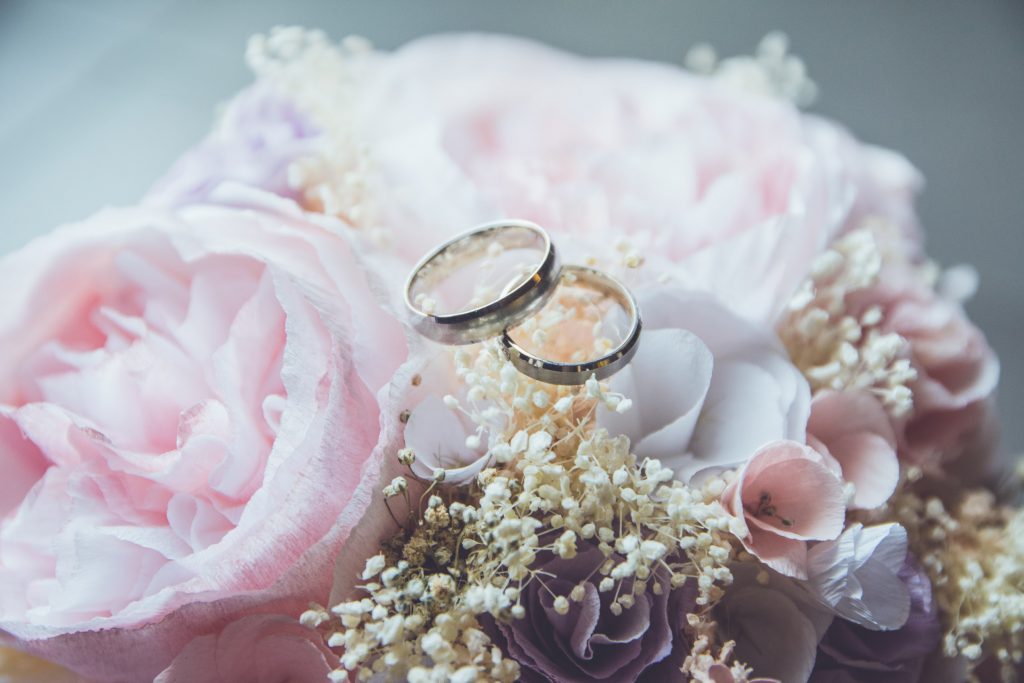 Wedding rings and flower display